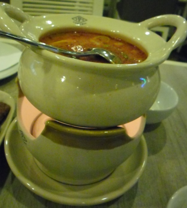 Tom Yum in double boiler - a candle in the bottom bowl keeps the soup hot