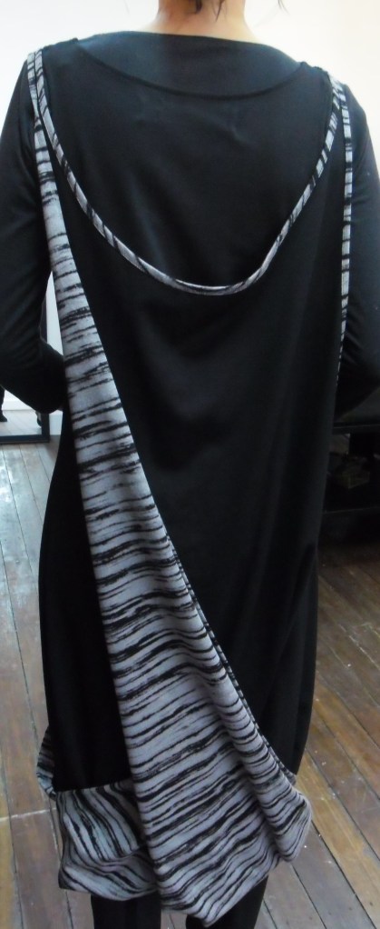 4 Minutes 33 Twist Dress photo  Surya Magazine