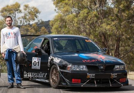 Daniel Cummins in his cool black racing car