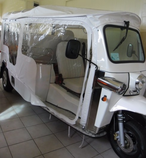 Limo tuk-tuk with rain covers - photo by LFW