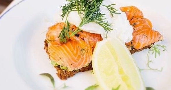 Smoked salmon and poached eggs with smashed avocado on toast