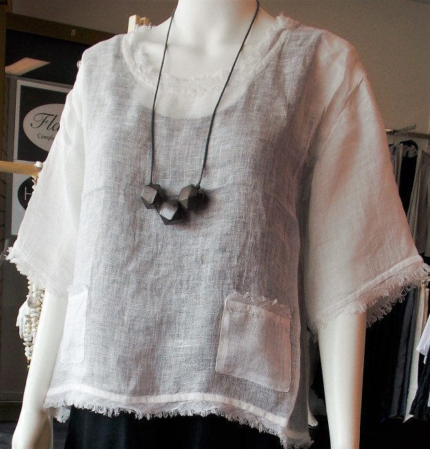 Beautiful summer top - perfect for cooler evenings with a splash of colour underneath. Jewellery by Morgan Marks