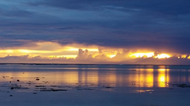 Sunrise on the reef and a calm lagoon
