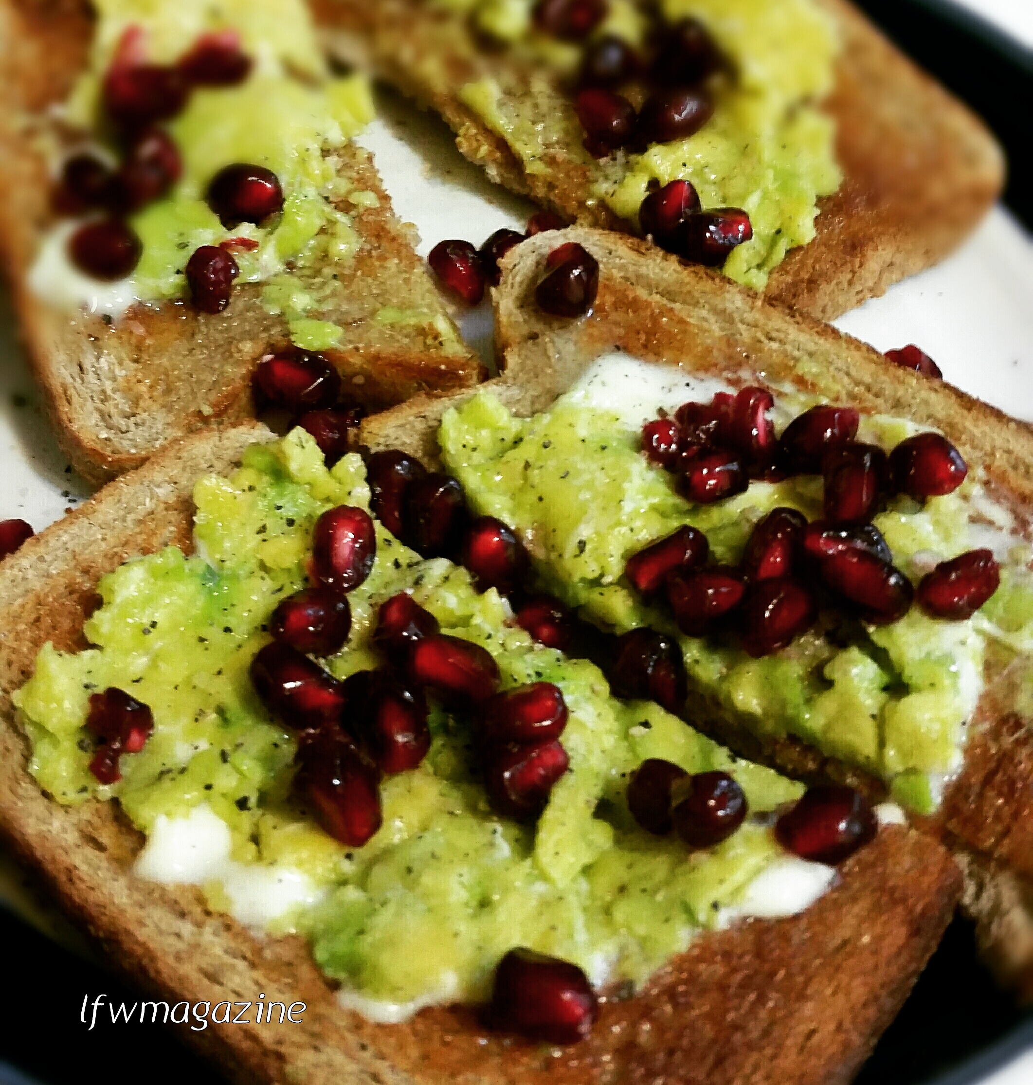 Avocado and pomegranate on toast